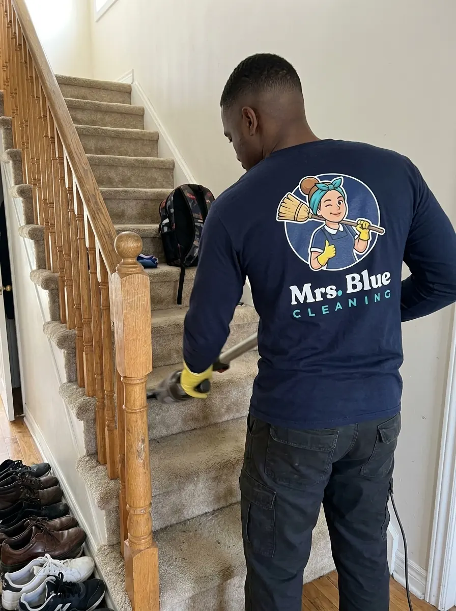 A Mrs. Blue cleaner at work in a stairs